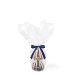 Two personal-size bundt cakes stacked vertically, packaged in a plastic container and gift-wrapped in cellophane. 