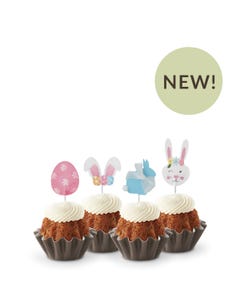 Easter-themed Carrot mini Bundt cakes with festive bunny and egg toppers, showcasing a variety of flavors and designs.