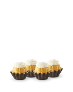 Lemon flavored mini bundt cakes topped with a cream cheese frosting swirl.