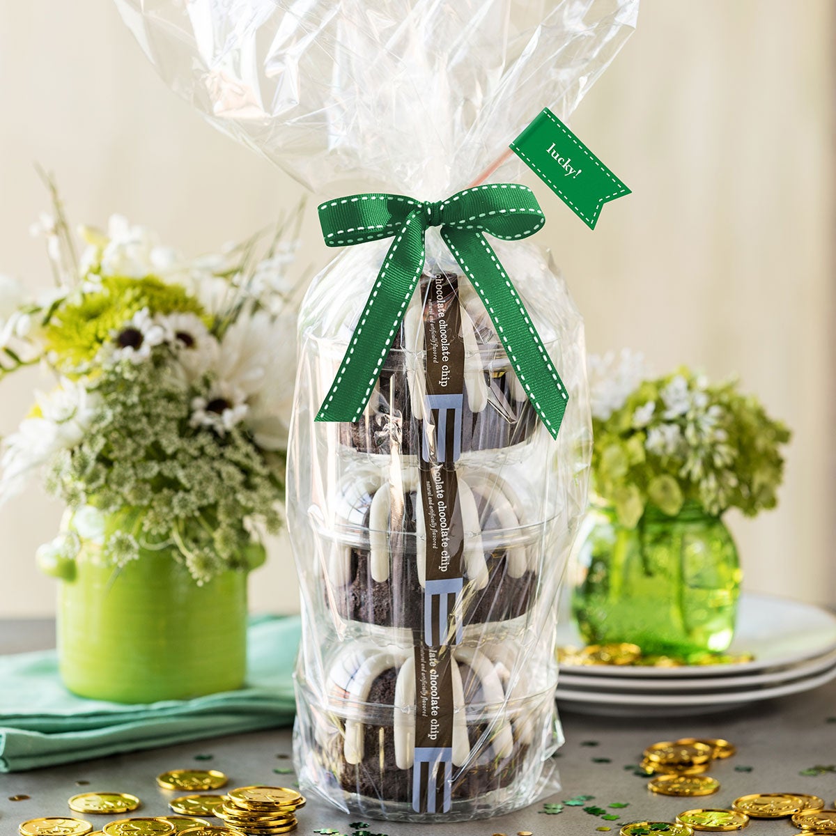 3 Chocolate Chocolate Chip Bundtlet wrapped with cellophane, tied with green ribbon and "lucky!" sentiment flag