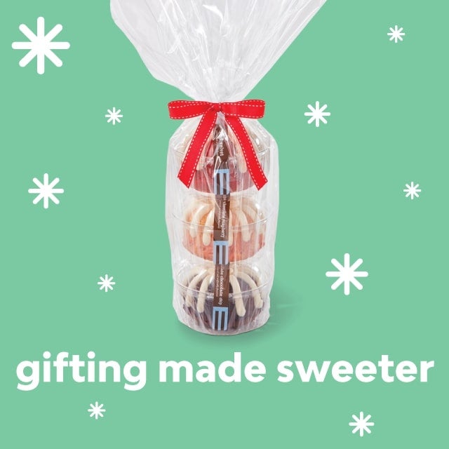 gifting made sweeter. featuring triple Bundtlet tower which include 3 Bundtlets gift wrapped in cellophane and tied with a red ribbon. 