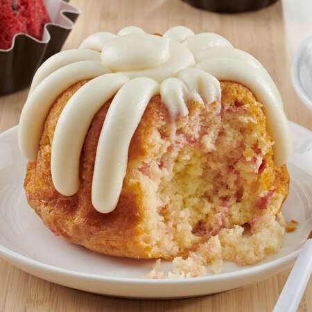Individual White Chocolate Raspberry Bundtlet showing the middle of the cake - Shop Bundtlets & Towers