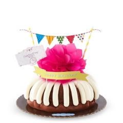 Birthday decorated Bundt Cake with birthday bow and present