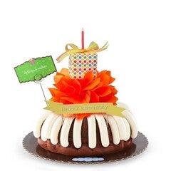 Birthday decorated Bundt Cake with birthday bow and present