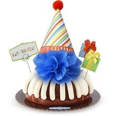 Birthday decorated Bundt Cake with birthday bow and present