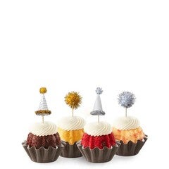 Assorted Bundtinis with gold and silver color mini party hats and pom poms